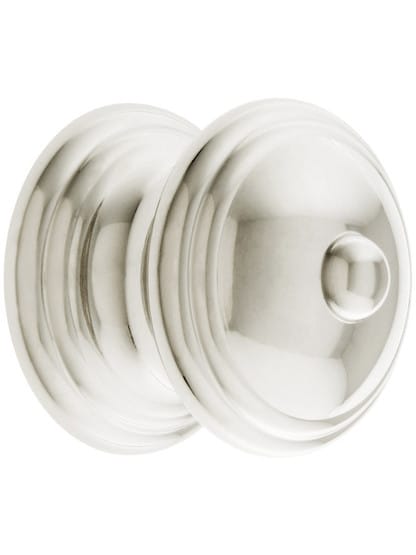 Traditional Brass Cabinet Knob with Turned Base - 1 1/4 inch Diameter in Polished Nickel.
